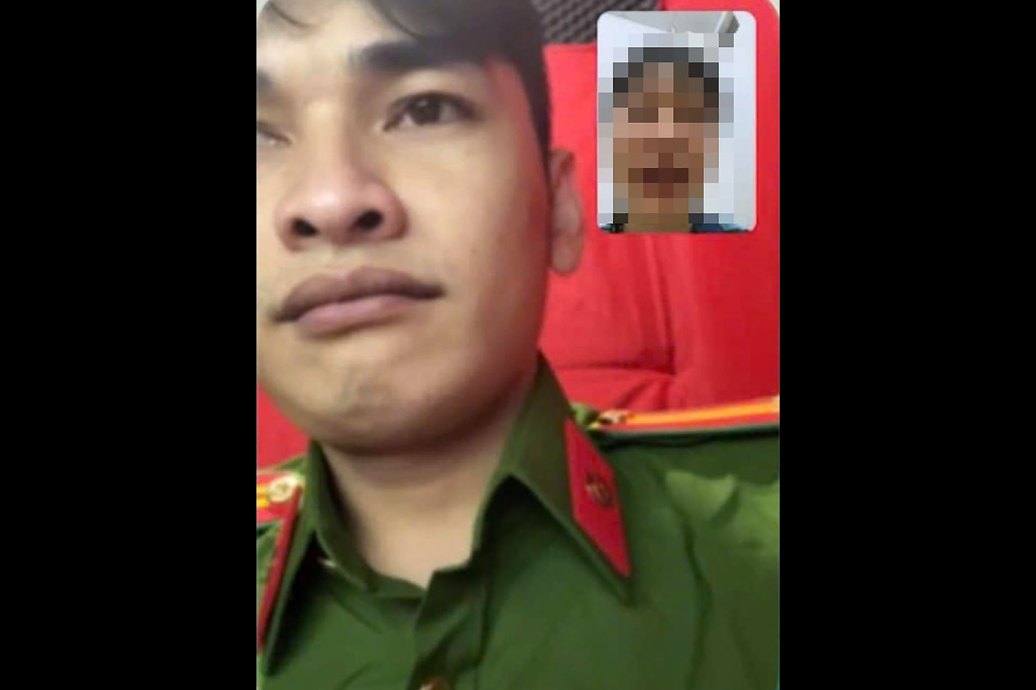 A scammer impersonating a police officer in a video call. Photo by police
